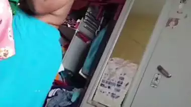 Grandmother wearing blouse and showing naked boobs
