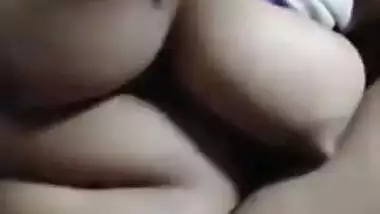 Naughty Desi bhabhi shows tits and fingers her XXX twat on camera